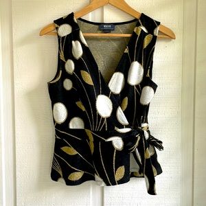 Maeve by Anthropologie Peplum Wrap Tank Top in gold, black, and white